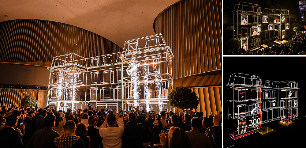 1734666667364616.png 图:宾客欣赏光影艺术秀,感受人头马酒庄300年的历史印记.png